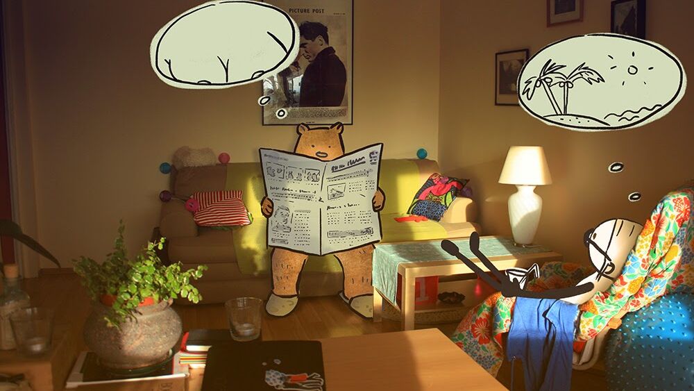The bear is reading on the living room couch