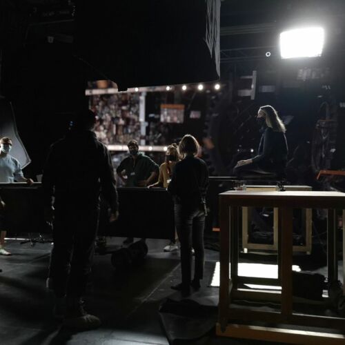 Team meeting during a shooting break on set